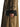 The Row India East-West dark brown leather bag carried by hand