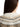 Shoulder and neck label detail of an ivory Barbour cardigan — LKN1813-WH71 at MINOX boutique, Oxford