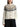 Ivory Barbour Fair Isle cardigan, front view with black trousers — LKN1813-WH71 at MINOX boutique, Oxford
