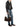 Model carrying the Acne Studios Camero dark brown camera bag with a black leather jacket and blue jeans