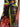 Tie-waist knot detail of a tartan and floral-print midi skirt — 2620108044058-978 at MINOX boutique, Oxford