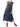 Model wearing an Issey Miyake navy pleated dress with red trainers