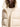Close-up of the fabric and construction of Moncler ivory hooded padded jacket
