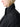 Close-up of the fabric and construction of Studio Nicholson black relaxed-fit jacket