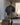 Brunello Cucinelli shearling bomber with polka-dot silk neck tie and tweed skirt — Brunello Cucinelli at MINOX boutique, Oxford